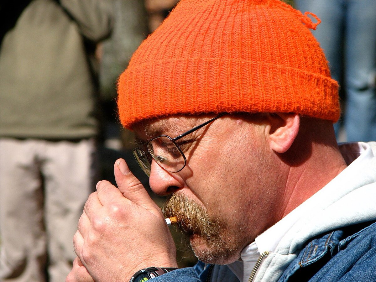 Barkley Marathons race director Lazarus Lake lighting a cigarette to start the race